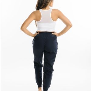 Zyia Navy desire cinch waist joggers size large. Brand new without tags